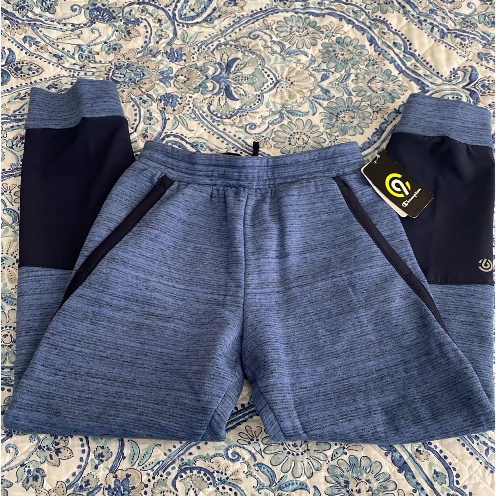 Boys Champion joggers size is 8/10